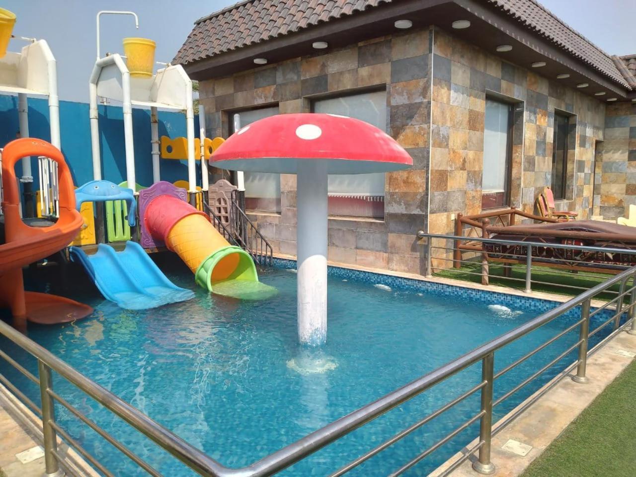 شاليهات الكوخ السويسري وأكوابارك Villa Ash Shishah Bagian luar foto