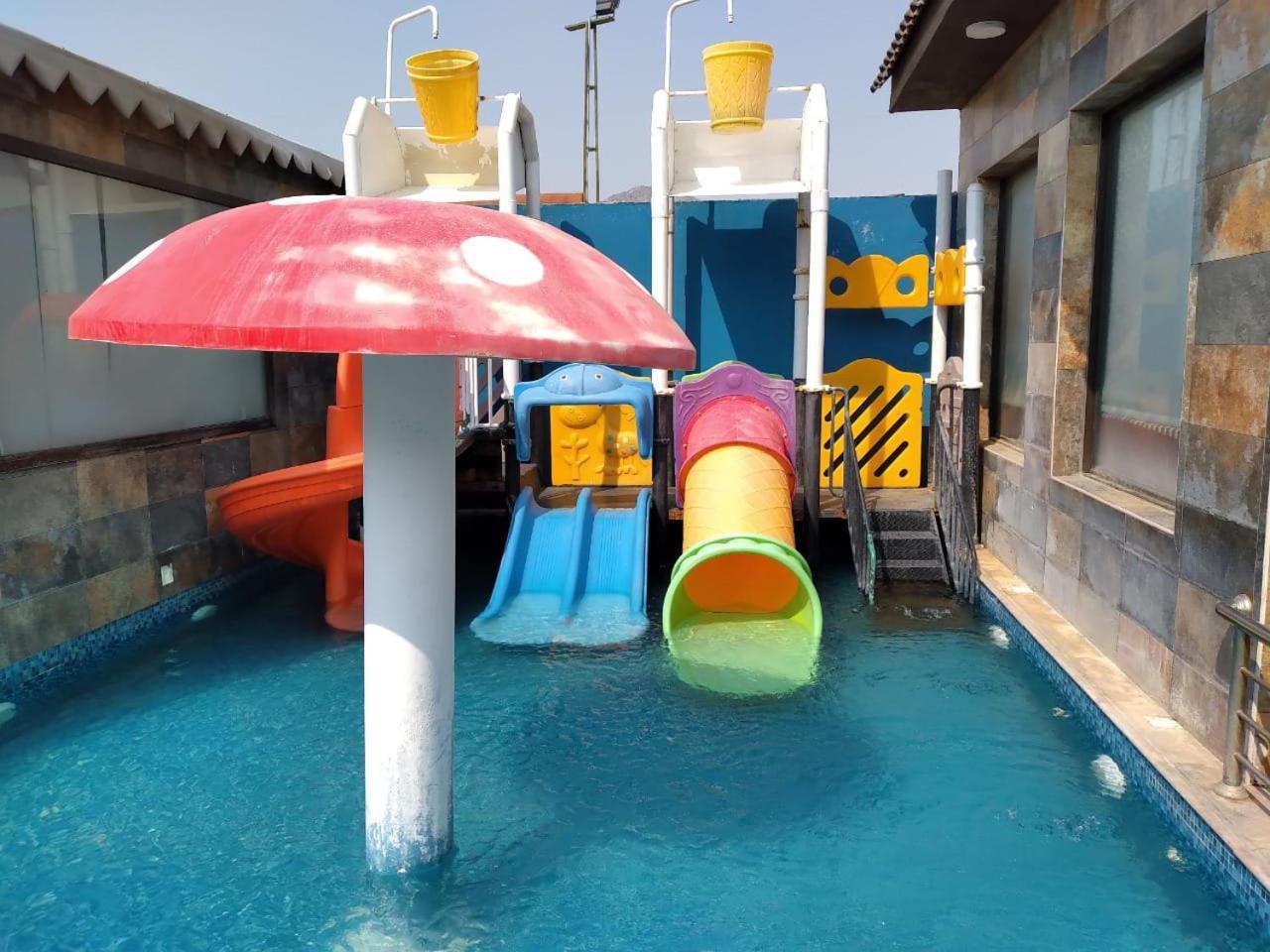 شاليهات الكوخ السويسري وأكوابارك Villa Ash Shishah Bagian luar foto