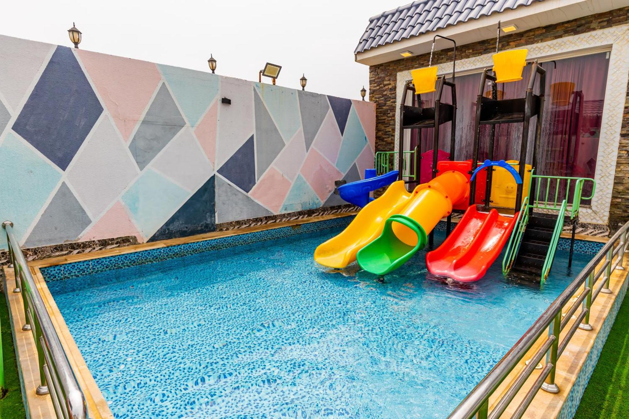 شاليهات الكوخ السويسري وأكوابارك Villa Ash Shishah Bagian luar foto