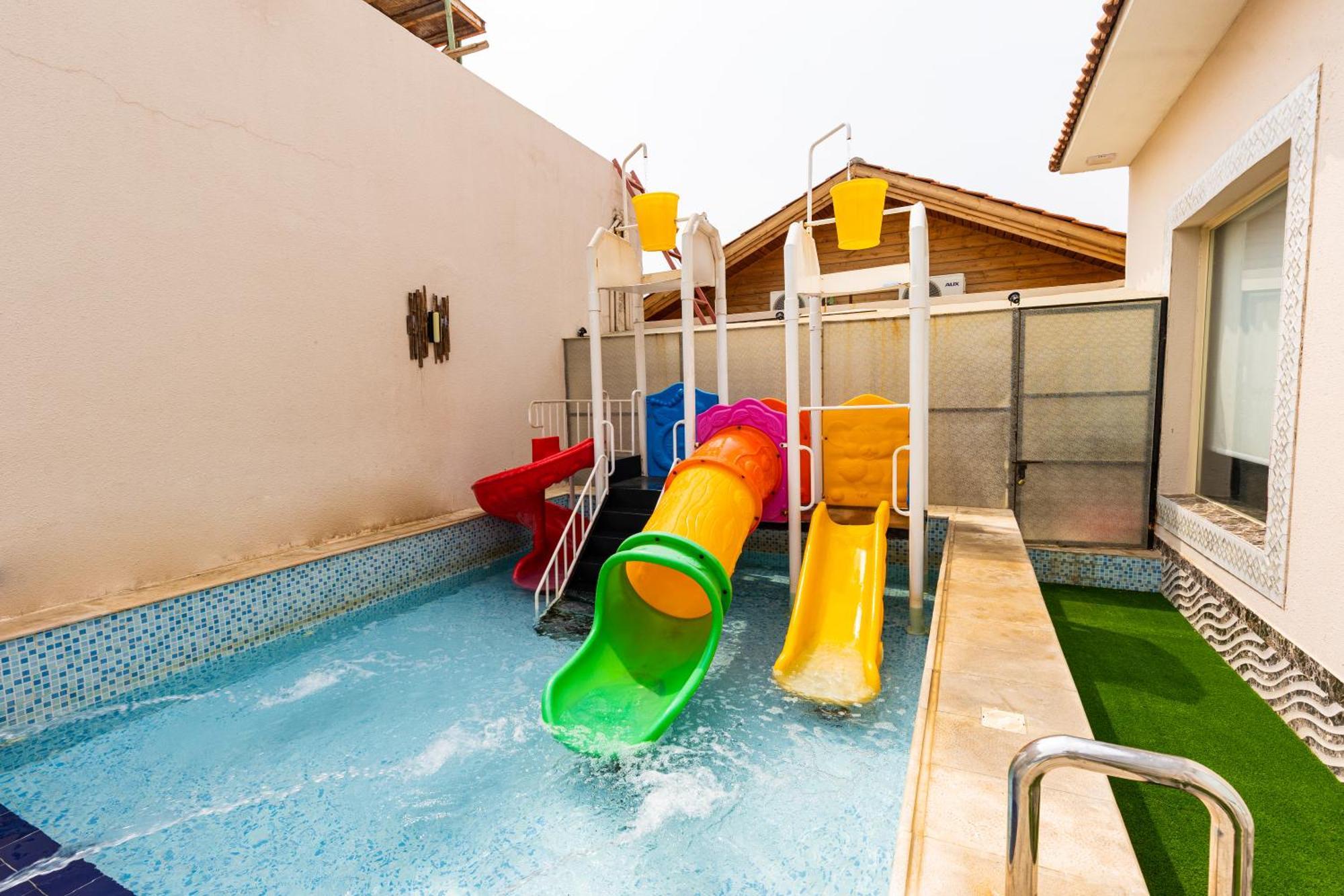 شاليهات الكوخ السويسري وأكوابارك Villa Ash Shishah Bagian luar foto